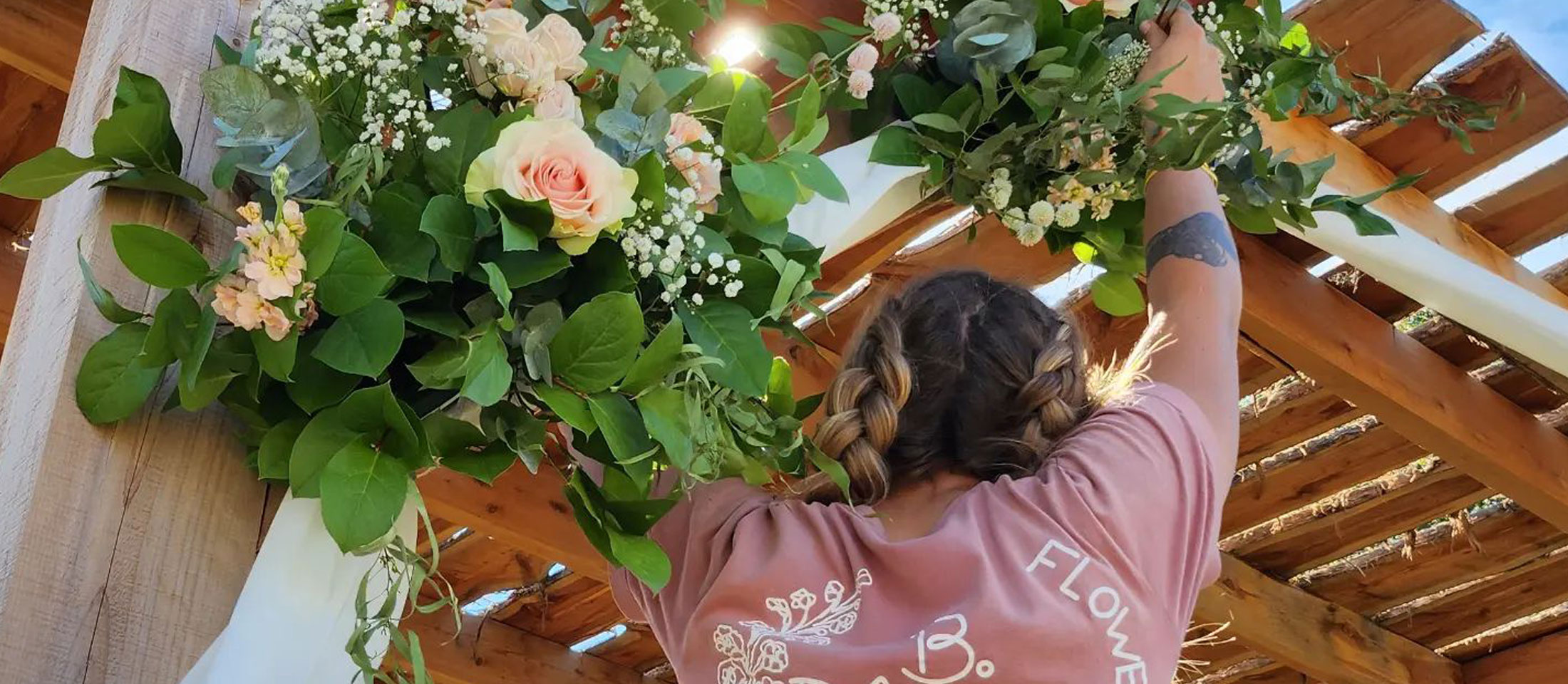 Woman standing and decorating for wedding.